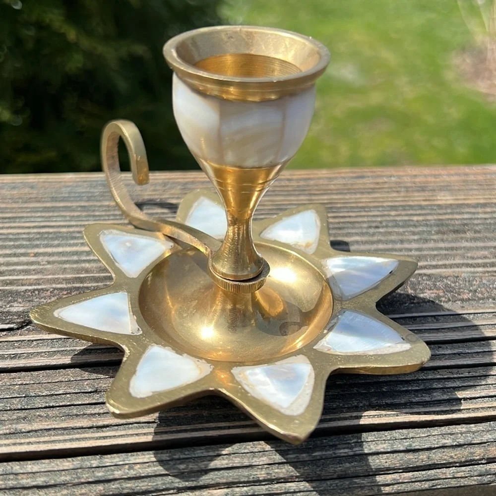 Brass candle holder.